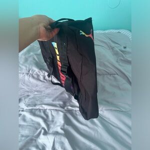 Puma large tote bag great. Great for travel or gym.